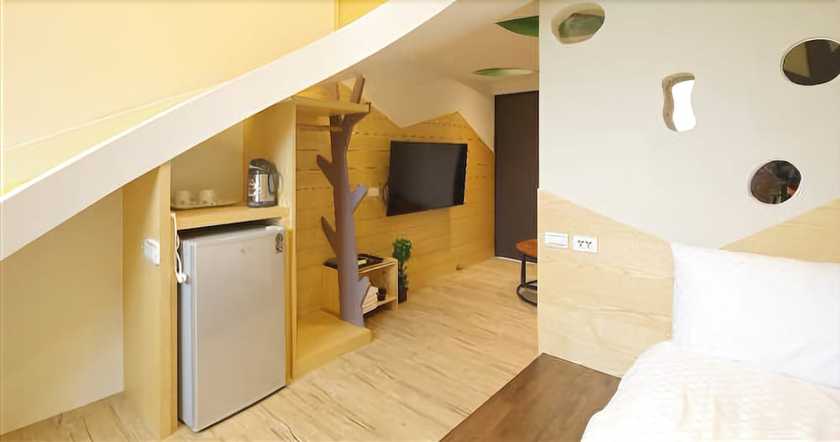 Imagen de la habitación del Hotel Happiness Yes Inn. Foto 11