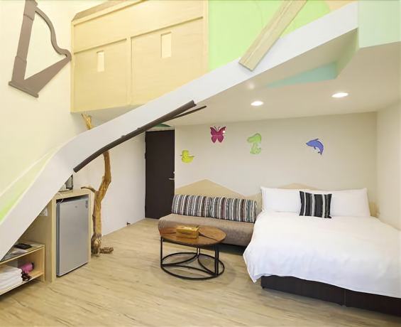 Imagen de la habitación del Hotel Happiness Yes Inn. Foto 16