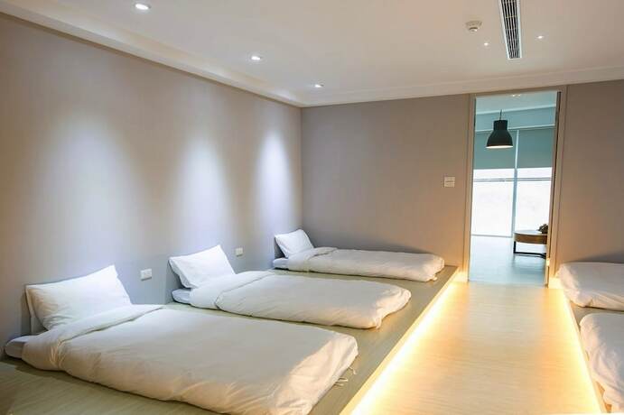 Imagen de la habitación del Hotel Happiness.Danshui. Foto 24