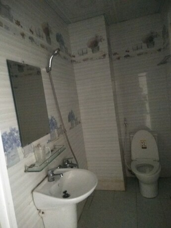 Imagen de la habitación del Hotel Happy Binh Chanh. Foto 18