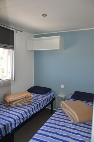 Imagen de la habitación del Hotel Happy Camp in Camping La Masseria. Foto 20