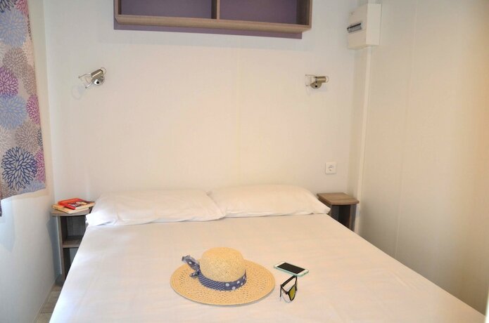 Imagen de la habitación del Hotel Happy Camp in Camping Laguna Village. Foto 19