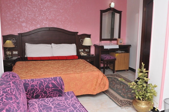 Imagen de la habitación del Hotel Happy City. Foto 9