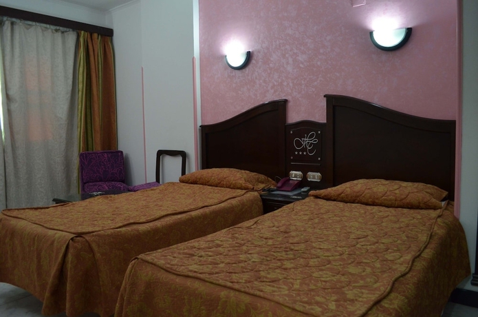 Imagen de la habitación del Hotel Happy City. Foto 13