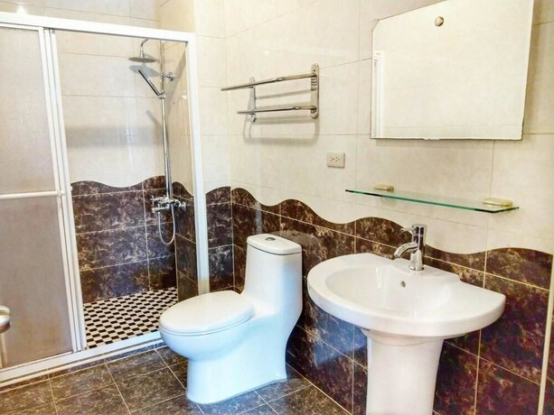 Imagen de la habitación del Hotel Happy Corner. Foto 14