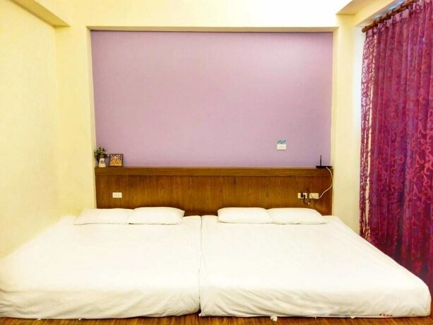 Imagen de la habitación del Hotel Happy Corner. Foto 15