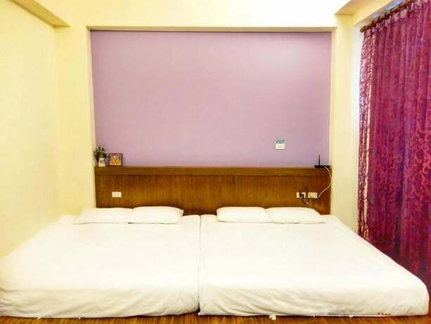 Imagen de la habitación del Hotel Happy Corner. Foto 16