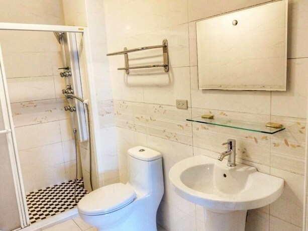 Imagen de la habitación del Hotel Happy Corner. Foto 17