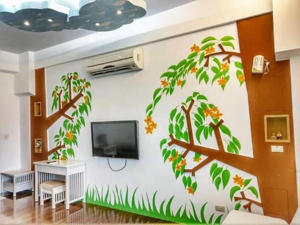 Imagen de la habitación del Hotel Happy Corner. Foto 18