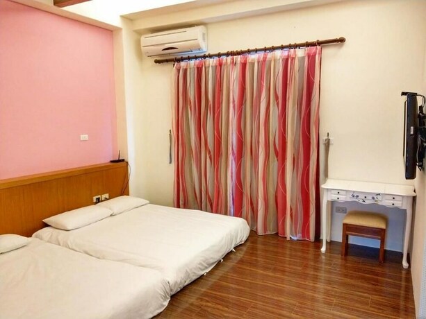 Imagen de la habitación del Hotel Happy Corner. Foto 23