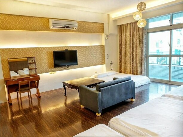 Imagen de la habitación del Hotel Happy Corner. Foto 31