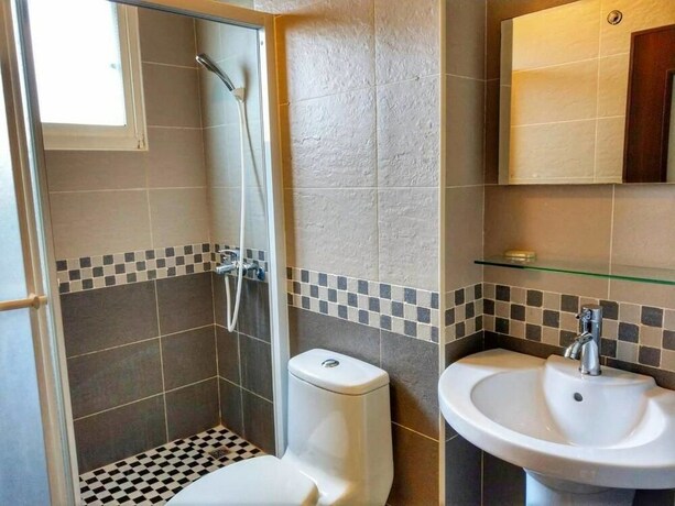 Imagen de la habitación del Hotel Happy Corner. Foto 32