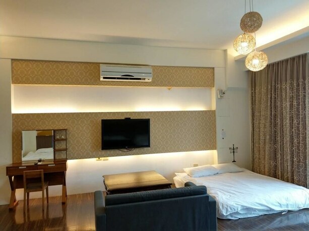 Imagen de la habitación del Hotel Happy Corner. Foto 35