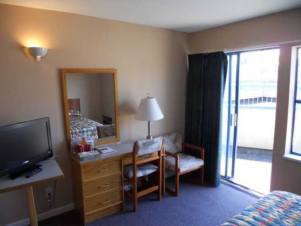 Imagen de la habitación del Hotel Happy Day Inn. Foto 5