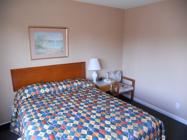 Imagen de la habitación del Hotel Happy Day Inn. Foto 8