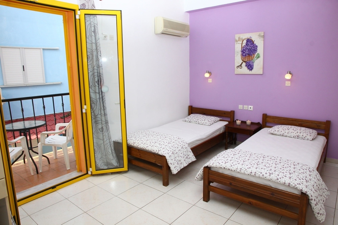 Imagen de la habitación del Hotel Happy Days Studios. Foto 4