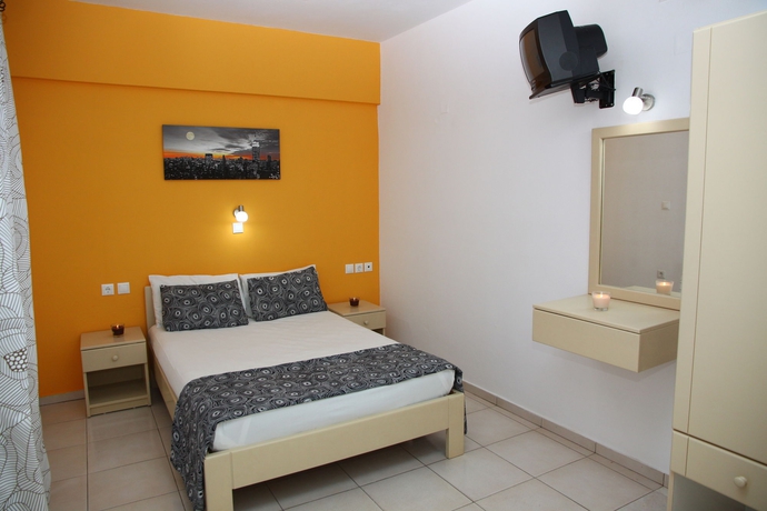 Imagen de la habitación del Hotel Happy Days Studios. Foto 5