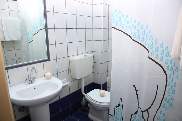 Imagen de la habitación del Hotel Happy Days Studios. Foto 12