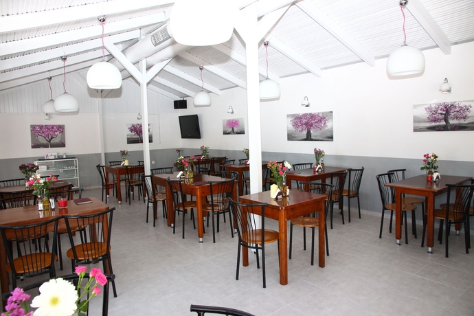 Imagen del bar/restaurante del Hotel Happy Days Studios. Foto 3