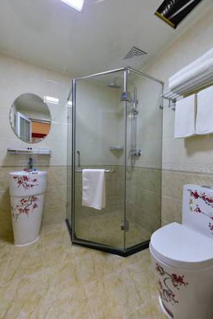 Imagen de la habitación del Hotel Happy Dragon Alley Beijing Tian An Men Forbi. Foto 2