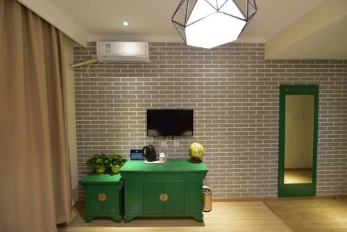 Imagen de la habitación del Hotel Happy Dragon Alley Beijing Tian An Men Forbi. Foto 3