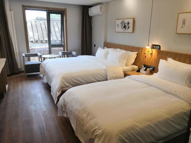 Imagen general del Hotel Happy Dragon City Culture (tian'anmen Forbidden City). Foto 7