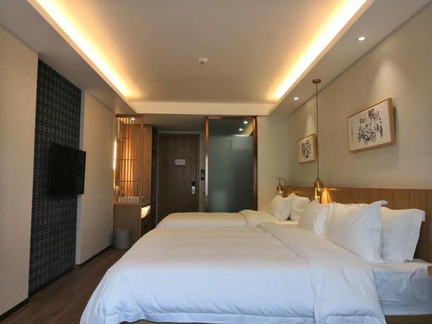 Imagen general del Hotel Happy Dragon City Culture (tian'anmen Forbidden City). Foto 8