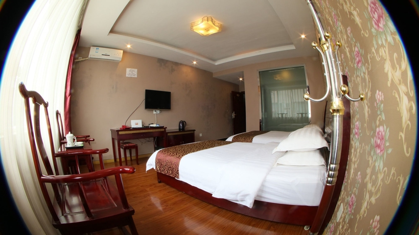Imagen de la habitación del Hotel Happy, Emei shan. Foto 4