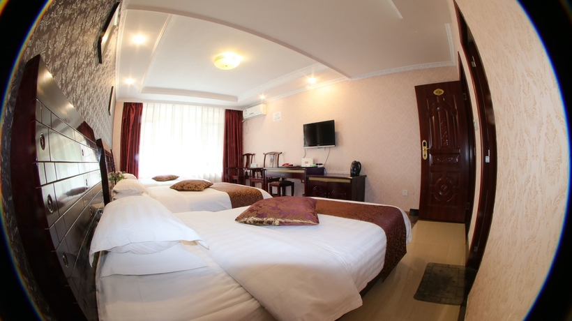 Imagen de la habitación del Hotel Happy, Emei shan. Foto 6