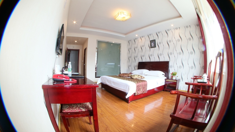 Imagen de la habitación del Hotel Happy, Emei shan. Foto 7