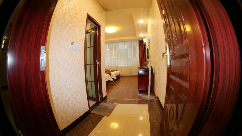 Imagen de la habitación del Hotel Happy, Emei shan. Foto 8