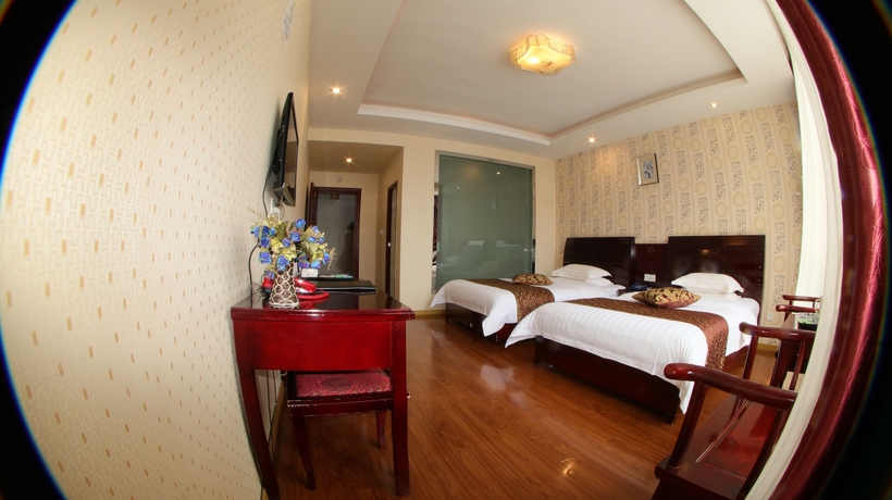 Imagen de la habitación del Hotel Happy, Emei shan. Foto 9