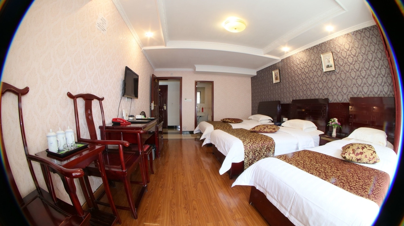 Imagen de la habitación del Hotel Happy, Emei shan. Foto 10