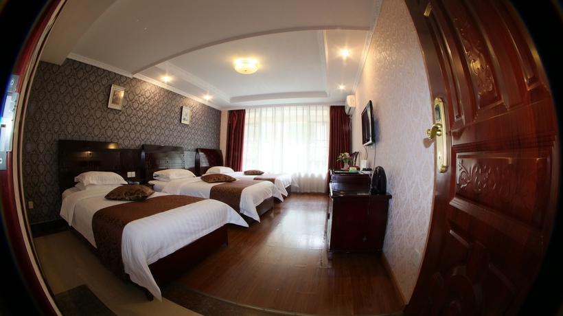 Imagen de la habitación del Hotel Happy, Emei shan. Foto 11