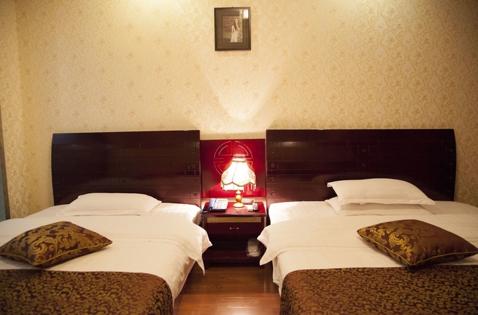 Imagen de la habitación del Hotel Happy, Emei shan. Foto 12