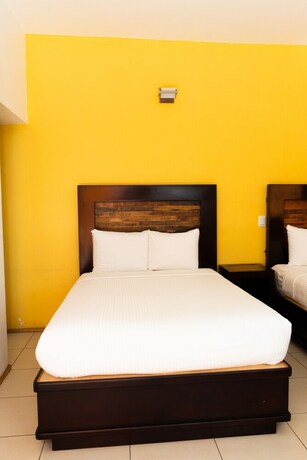 Imagen de la habitación del Hotel Happy Express. Foto 22