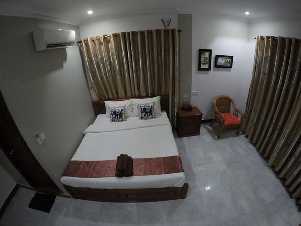 Imagen de la habitación del Hotel Happy Family. Foto 10