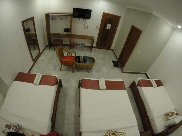 Imagen de la habitación del Hotel Happy Family. Foto 15