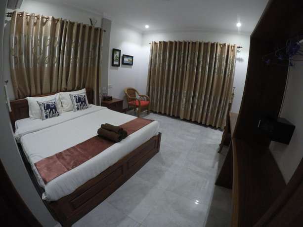 Imagen de la habitación del Hotel Happy Family. Foto 18