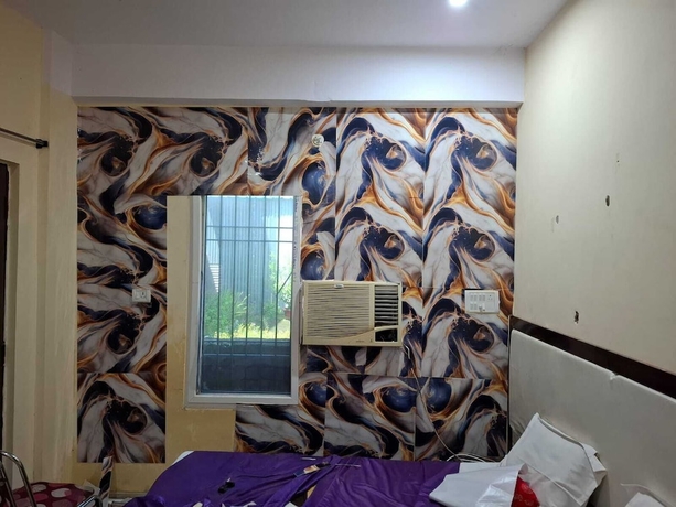 Imagen de la habitación del Hotel Happy Guest House. Foto 3
