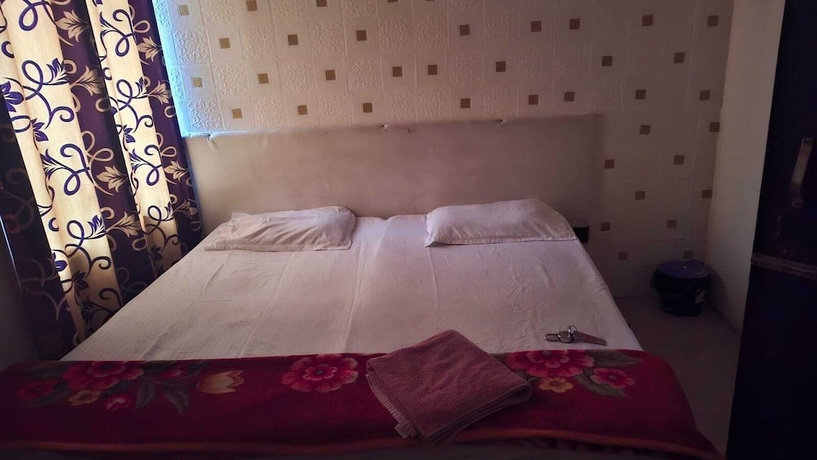 Imagen de la habitación del Hotel Happy Guest House. Foto 5