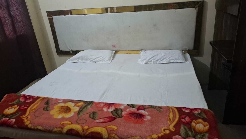 Imagen de la habitación del Hotel Happy Guest House. Foto 10