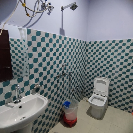Imagen de la habitación del Hotel Happy Guest House. Foto 11