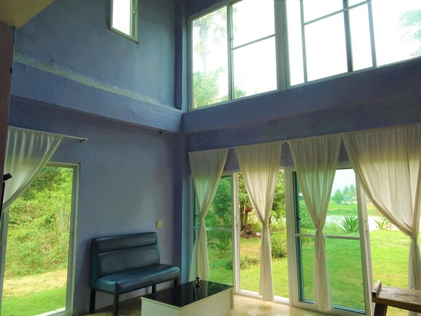 Imagen de la habitación del Hotel Happy Hamlets Resort. Foto 15