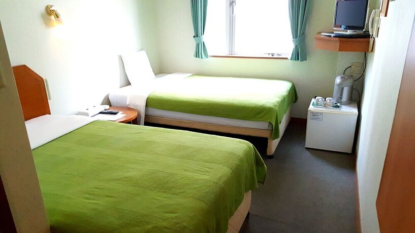Imagen de la habitación del Hotel Happy Holiday Ishigakijima. Foto 32