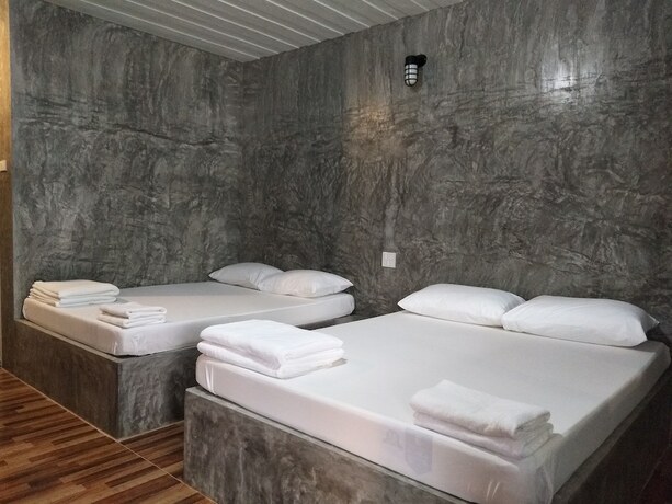 Imagen de la habitación del Hotel Happy Home Resort. Foto 17