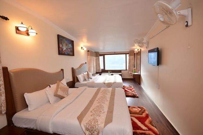 Imagen de la habitación del Hotel Happy Home The Lake Paradise. Foto 17
