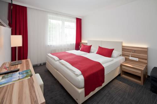 Imagen de la habitación del Hotel Happy House - Das Fröhliche Urlaubszuhause. Foto 4