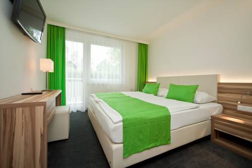 Imagen de la habitación del Hotel Happy House - Das Fröhliche Urlaubszuhause. Foto 9
