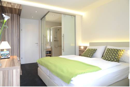 Imagen de la habitación del Hotel Happy House - Das Fröhliche Urlaubszuhause. Foto 11